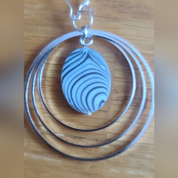 Black and White Shell Hoop Earrings - Picture 3 of 6